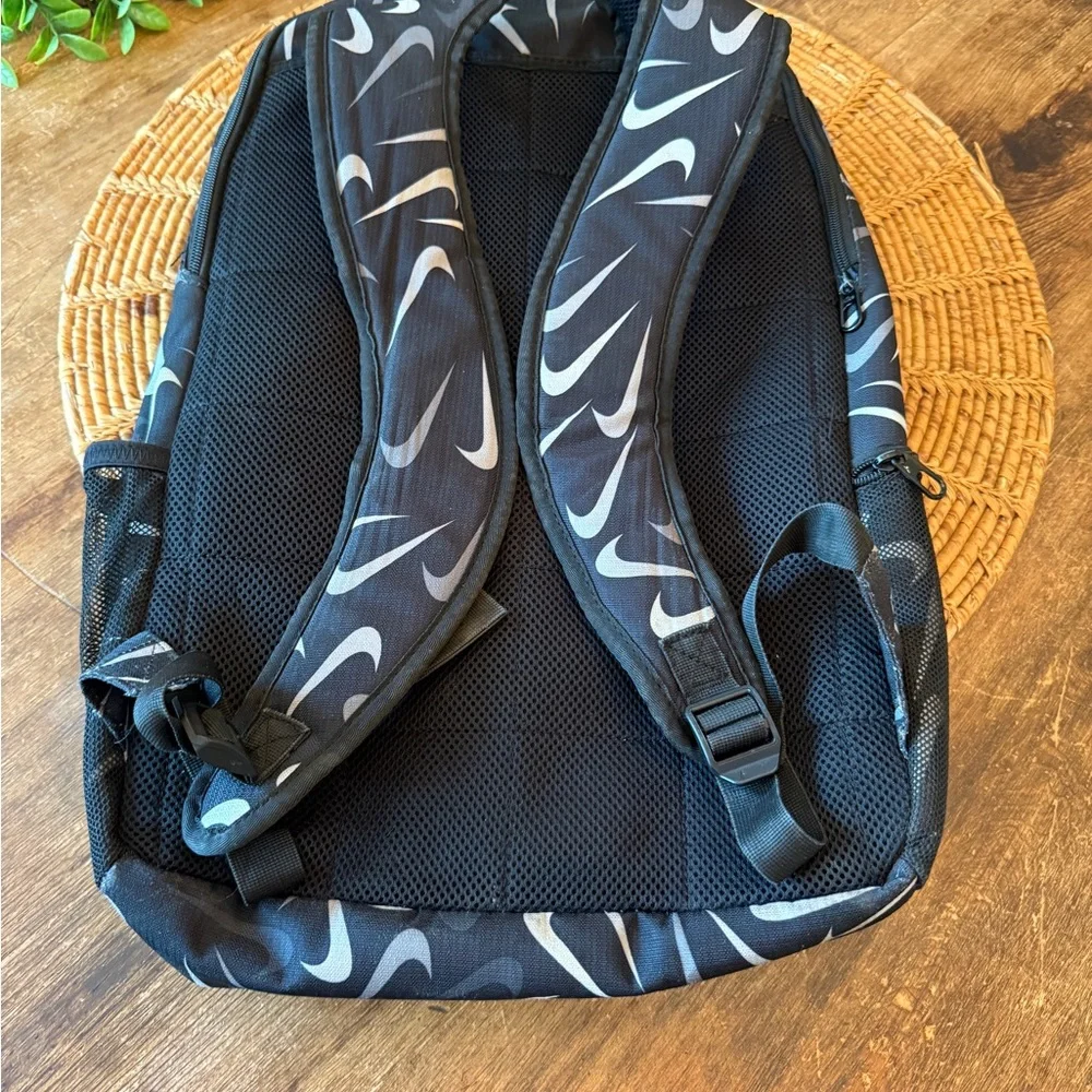 Nike Black and Gray Swoosh Logo Pattern Backpack